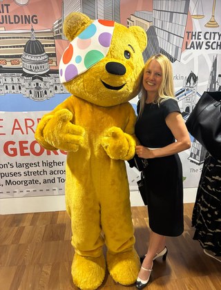 Helen Roberts with Pudsey Bear at the BBC Children in Need event