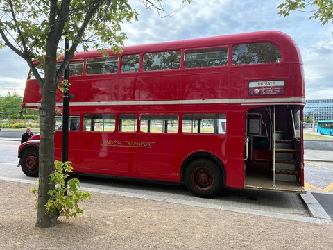 A vintage London Routemaster bus outside Stowe School